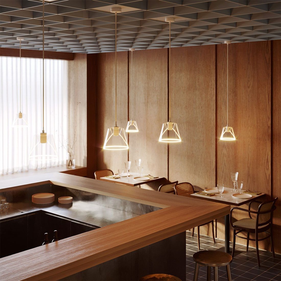 Ghost LED Designleuchtmittel als offene Pendelleuchten über Tischen in einem modernen Restaurant